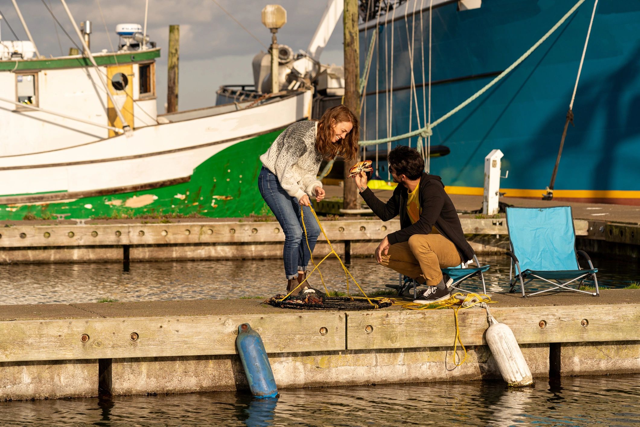 Person getting help near a dock
