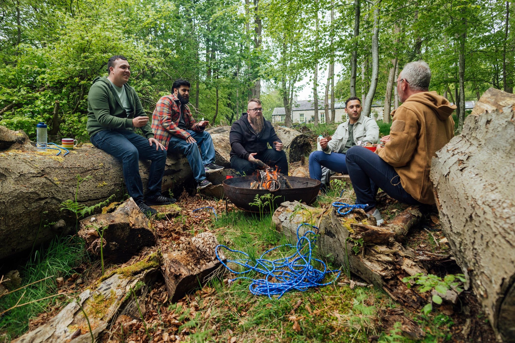 Outdoor group discussing gear and setup